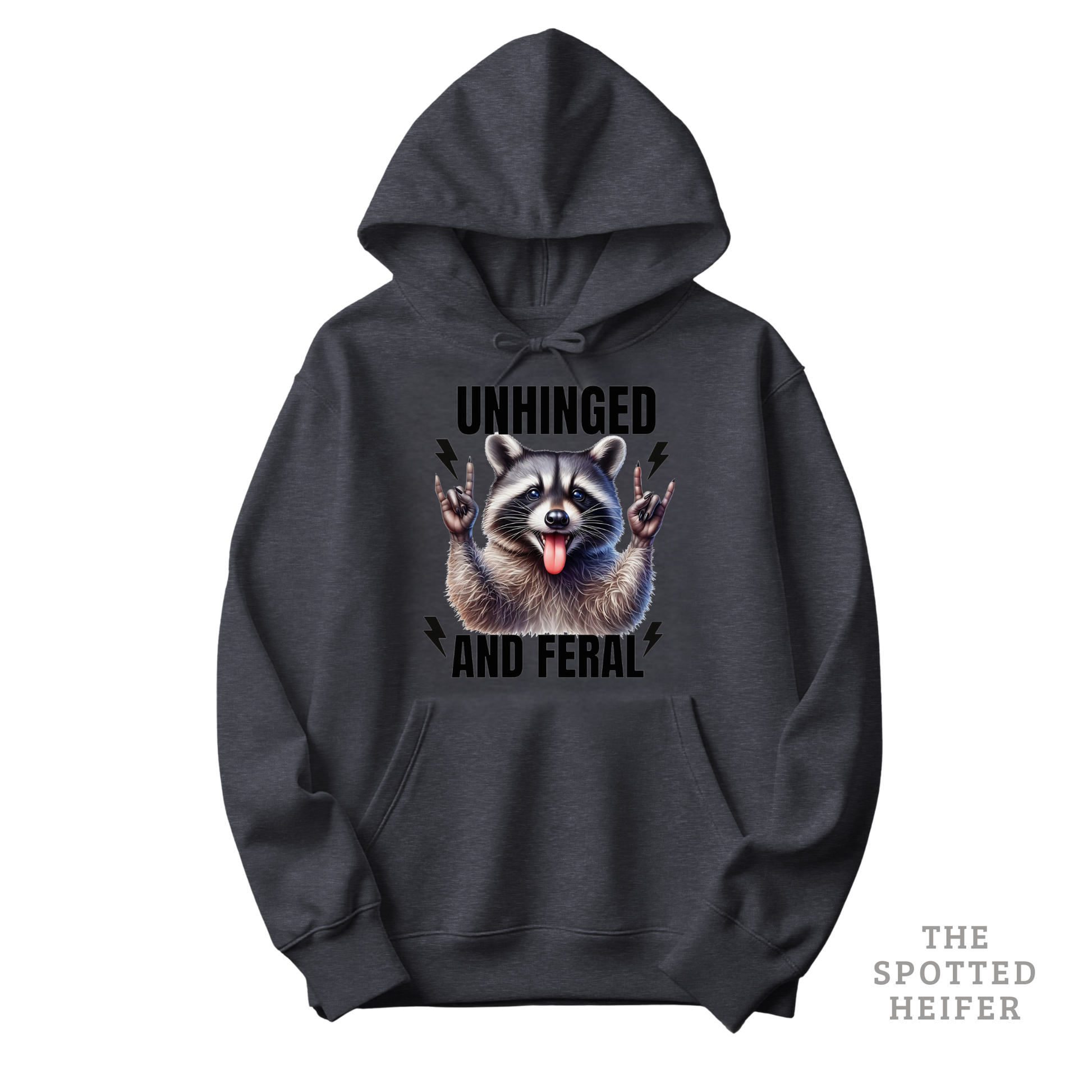 Dark heather Gildan 18500 hoodie featuring “Unhinged and Feral” text with a mischievous raccoon graphic on the front – funny western hoodie by The Spotted Heifer.